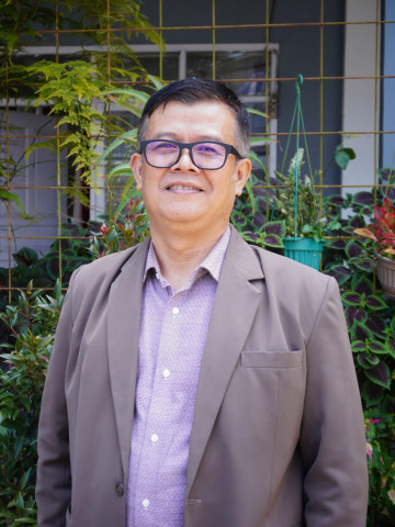 Muhamad Nurcholis, S.HI